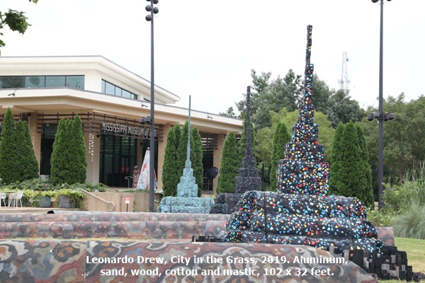 Leonardo Drew, City in the Grass, 2019. Aluminum, sand, wood, cotton and mastic, 102 x 32 feet.