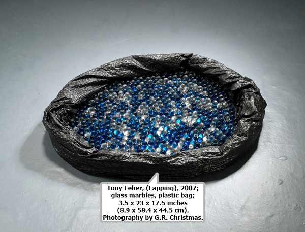 click to enlarge- double click to reduce Tony Feher, (Lapping), 2007; glass marbles, plastic bag; 3.5 x 23 x 17.5 inches (8.9 x 58.4 x 44.5 cm). Photography by G.R. Christmas.