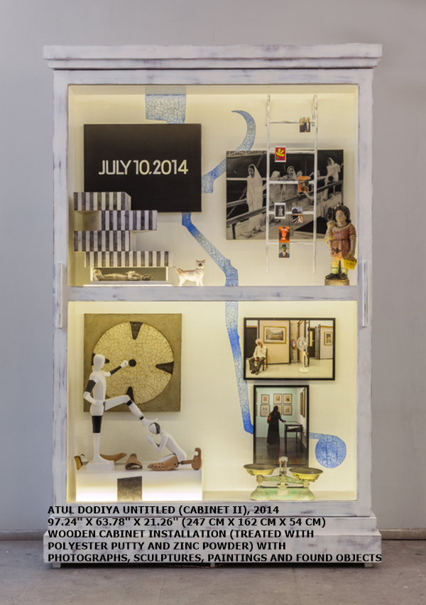 ATUL DODIYA
UNTITLED (CABINET II), 2014
97.24'' X 63.78'' X 21.26'' (247 CM X 162 CM X 54 CM)
WOODEN CABINET INSTALLATION (TREATED WITH POLYESTER PUTTY AND ZINC POWDER) WITH PHOTOGRAPHS, SCULPTURES, PAINTINGS AND FOUND OBJECTS